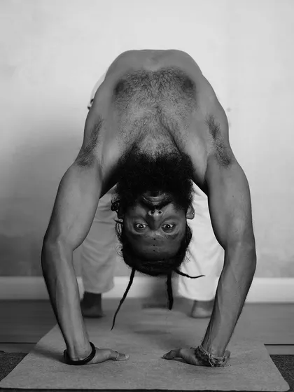 Urdhva Dhanurasana (Wheel Pose). This deep backbend opens the entire front body, stimulates the nervous system, and builds strength in the arms, legs, and spine. It is an energizing pose that opens the heart chakra.