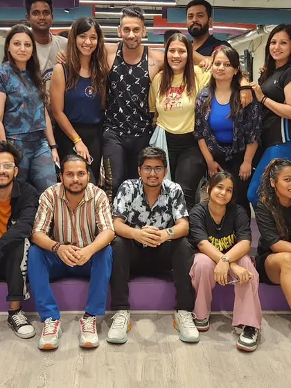 A full group shot of our new Zumba instructors. You can see the diversity of people who come to get certified, proving that anyone with passion can become a leader in the fitness world.