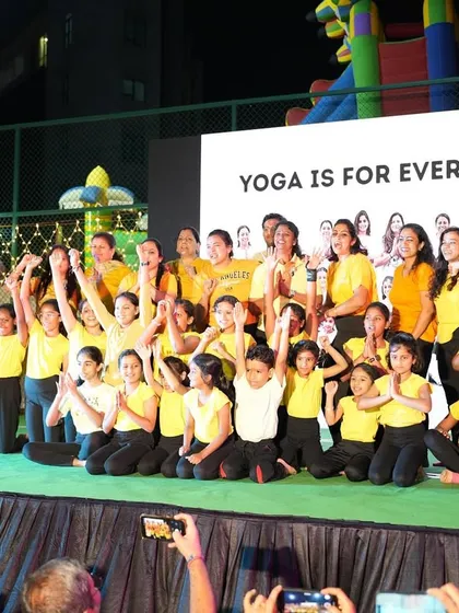 This is our tribe. A proud moment on stage after a community performance, celebrating our hard work, our growth, and the joy we find in practicing yoga together.