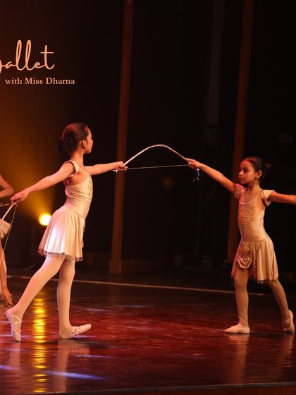 Our Ballet Level 3 students performing 'The Warrior.' This piece combined powerful movements with elegant poise, telling a story of strength and resilience through dance.