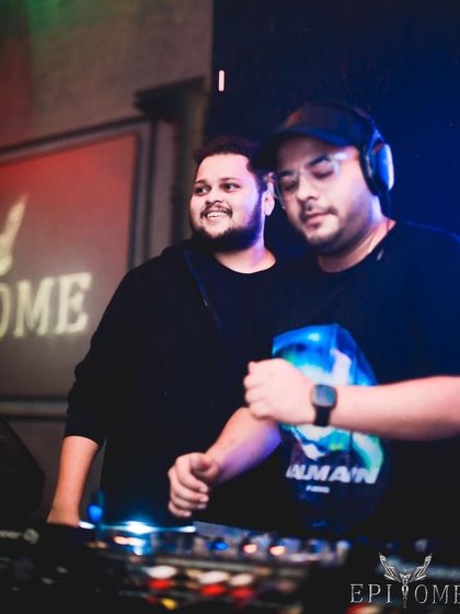 We believe in creating happiness for our audience. A candid moment of us enjoying the vibe as much as the crowd does.