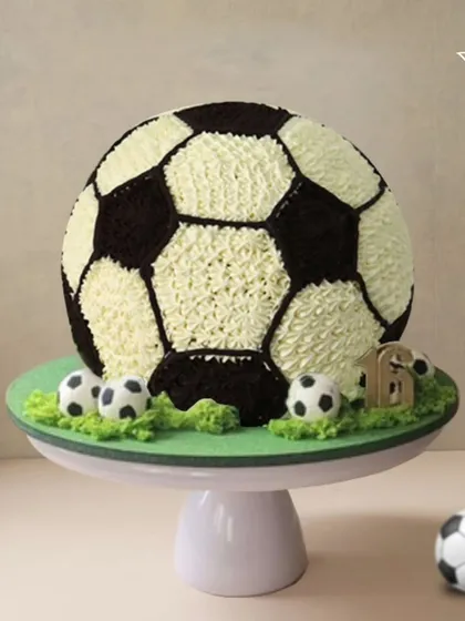 A 3D football cake for a 16th birthday. The realistic texture and design make it a perfect centerpiece for a soccer-loving teen.
