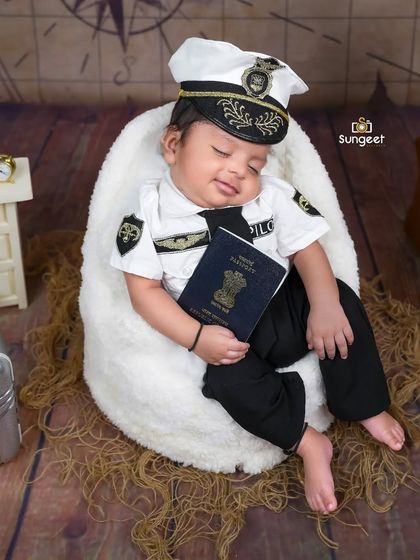Ready for takeoff! Dressed as a pilot, this newborn is all set to explore the world. We love creating imaginative stories with our themed sessions.