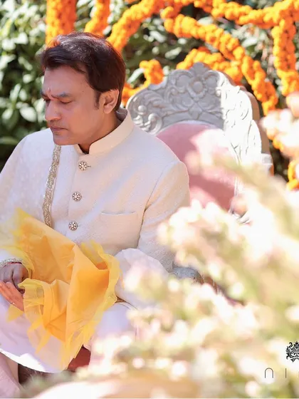 The groom during his wedding ceremony. Our goal is to create an outfit that not only looks magnificent but also feels comfortable, allowing you to be fully present in your most important moments.