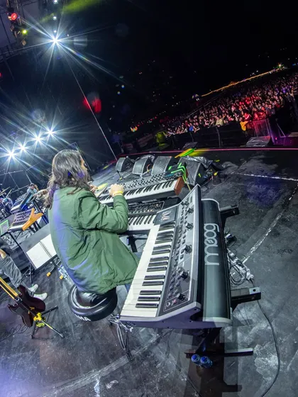 A wide-angle view of my keyboardist on the massive stage at Jazz Al Parque. The setup allows us to explore a rich sonic landscape, from synths to traditional tones.