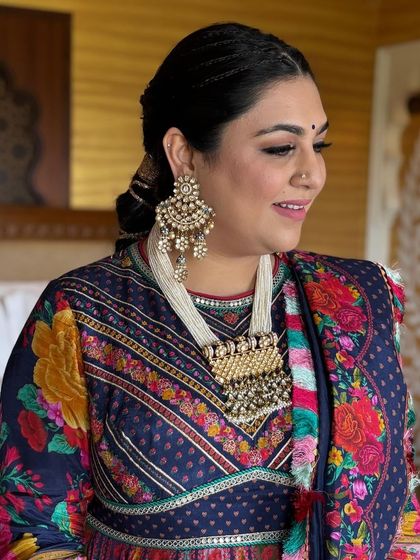 Another beautiful shot of the Navratri look, showing the intricate jewelry and the neatness of the braids at the crown.