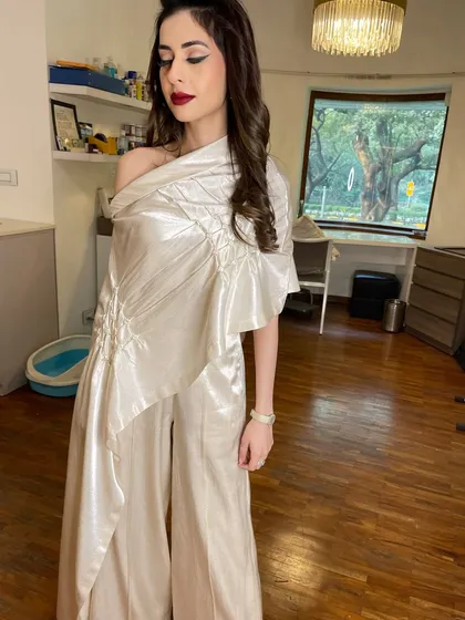 A classic and chic look perfect for a day brunch or elegant evening event. I created a flawless base, a sharp winged liner, and a bold red lip that makes a timeless statement.