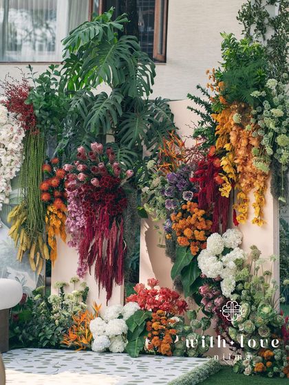A wide view of the 'Garden of Gaia' floral wall, a true masterpiece of botanical design.