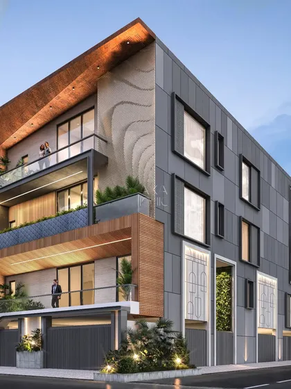 This residential project features a facade with offset window frames, creating a playful, unconventional pattern on the gray paneled wall. This is contrasted with a section of wood cladding and open balconies.