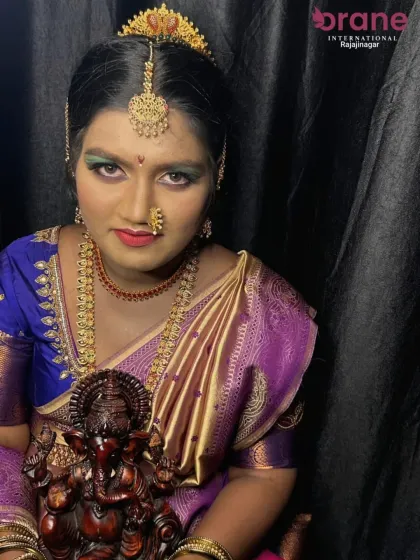 A powerful and direct portrait of the Ganesha Chaturthi makeup look.