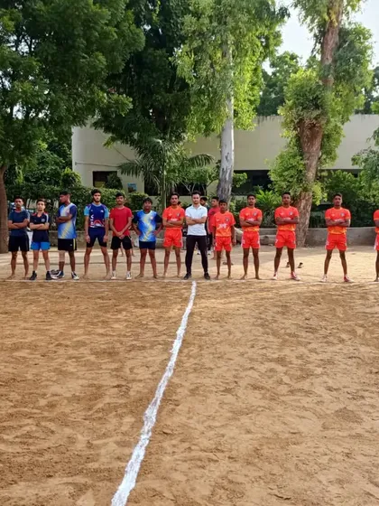 Our team lined up on the ground, ready for practice. The discipline and unity of the team are visible even before the game starts.