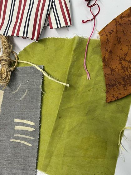 A collection of fabric swatches and materials used in my bleach and fabric art workshops.