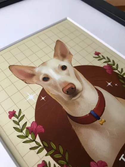 An angled, close-up view of the framed Togo portrait. This perspective highlights the smooth finish of the print and the quality of the frame.