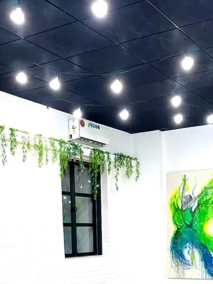 A look at our second studio space, filled with natural light and inspiring artwork. We have multiple studios to run different batches simultaneously.