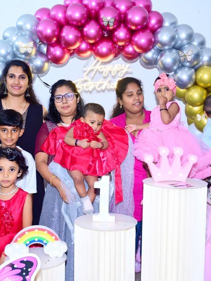 Capturing the whole gathering is just as important. This is a group photo with family and friends celebrating a first birthday, showing how I can organize and shoot larger groups during an event.