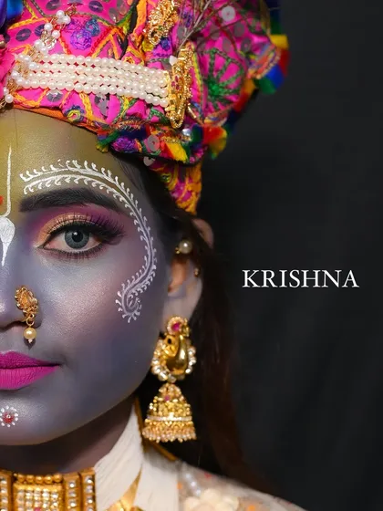 A powerful half-face portrait of our Krishna look, showcasing the detailed eye makeup and face paint.