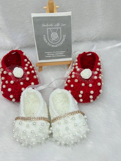 Two pairs of my formal booties, one in red with pearls and a rose, and the other in white with pearls and a sparkling stone-studded strap.