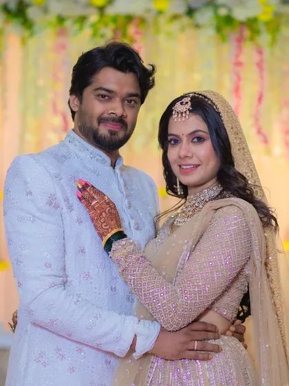 A duplicate of the previous image, showing the happy couple.