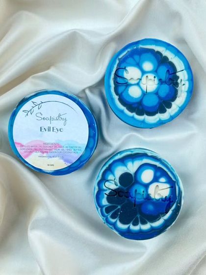 The popular Evil Eye soap, designed to bring a touch of protection and style to your bathroom. The concentric blue and white circles are mesmerizing.