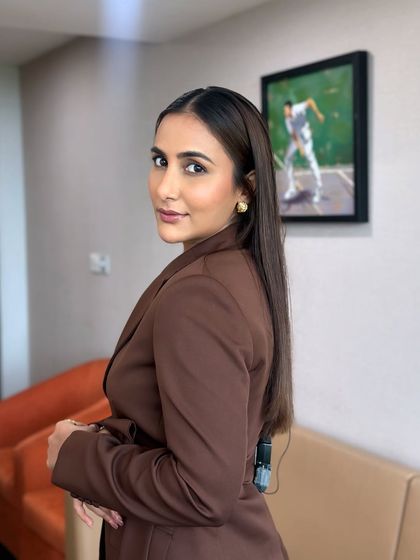 Another angle of this clean and professional makeup look for Sneha. The focus is on enhancing her features naturally, ensuring she looks and feels her best while on camera for Sony Sports Network.