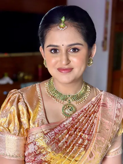 The gorgeous Chandrika celebrating her baby’s naming ceremony. This is a perfect example of my signature dewy, glass-skin makeup that looks fresh and radiant, letting her natural glow shine through on this special family day.