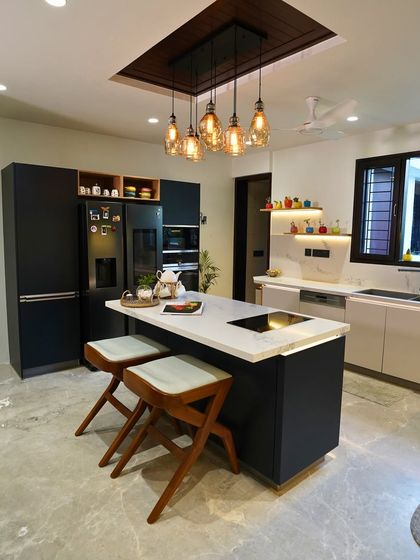 Fariha Nizam’s Bengaluru kitchen is designed for a multi-generational family. The island features an induction hob and seating, creating a modern social hub.