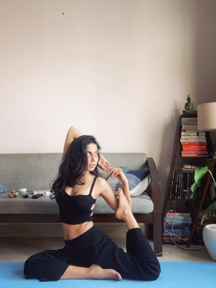The Mermaid Pose, a beautiful variation of Pigeon Pose that adds a gentle twist and shoulder opener to the hip stretch.