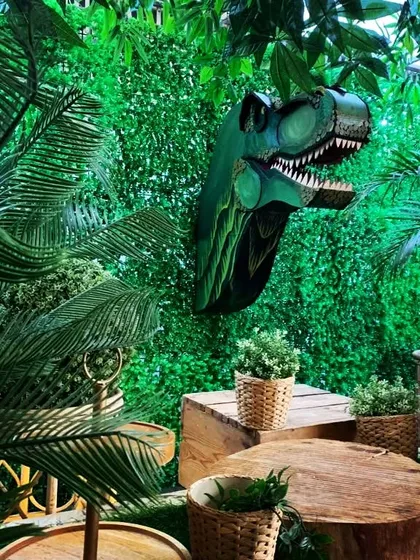Imagine a T-Rex bursting through the wall at your party. I built this detailed dinosaur head from sturdy, eco-friendly cardboard to create a thrilling photo backdrop for a jungle-themed event. It's a perfect example of a large-scale, high-impact installation.
