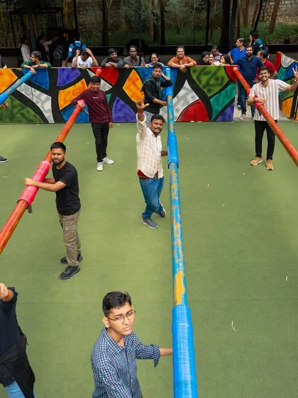 An overhead shot of our life-sized Human Foosball court. Here, you and your colleagues are the players, strapped to the poles.