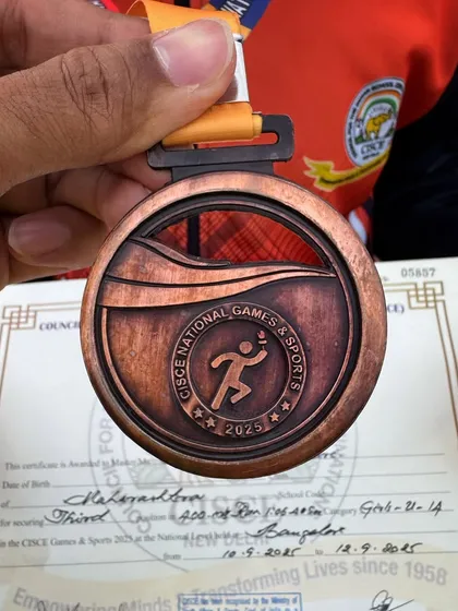A close-up of the CISCE National Games & Sports bronze medal. Every medal is a story of effort, grind, and the fire to compete.