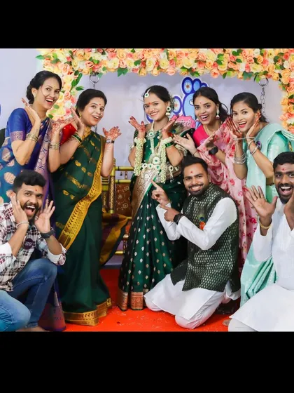 A fun-filled group photograph with family and friends, all sharing in the couple's joy. I make sure to capture these lively, collective memories.