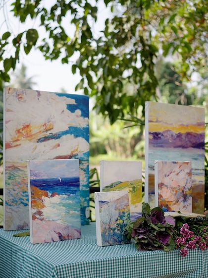 To personalize the Spanish-themed Haldi, we displayed a collection of impressionist-style paintings that echoed the colors and feel of the decor, adding a layer of artistry to the event.