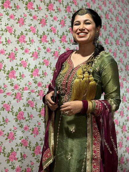 A beautiful Punjabi suit look. The olive green and wine color combination is rich and festive, perfect for a Lohri celebration or a Dhol night.