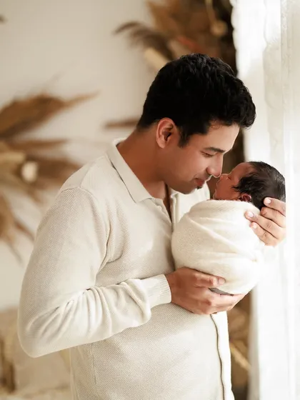 Tender moments between a father and his newborn. These lifestyle shots capture the quiet, unposed interactions that are so full of love.