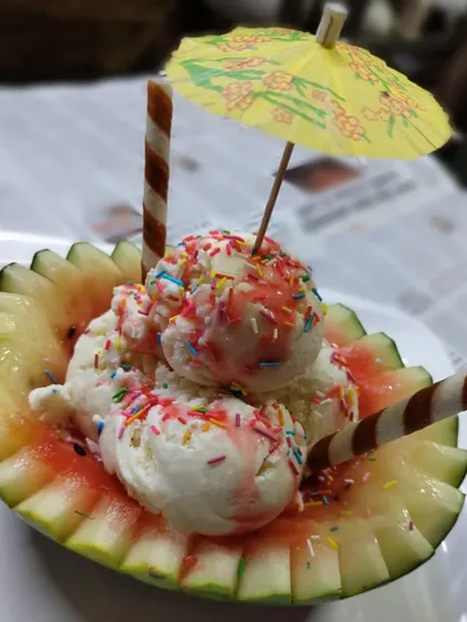 A special dessert for a Cocomelon themed party. We served our Tender Coconut Ice Cream inside a creatively carved watermelon bowl, complete with a little umbrella.