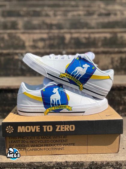 Believe! We created these custom Nike sneakers for a Ted Lasso fan, featuring the AFC Richmond team crest hand-painted over a yellow swoosh. The back of the shoe has the iconic "BELIEVE" sign.