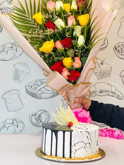 This image shows my mixed rose bouquet paired with a delicious-looking cake from a local baker. I can coordinate with other vendors to make your gift complete.