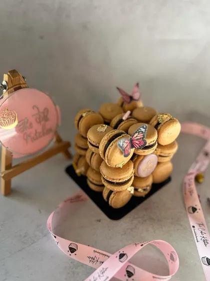 This angle captures the full setup, including my branded ribbon and tag. A macaron tower makes a sophisticated and delicious centerpiece for any event.