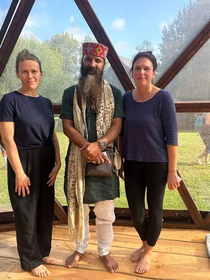 With two students after a session. Yoga is not just about physical postures; it is a journey to meet your true self. I am here to guide anyone who is tired of the rat race and seeking inner peace.