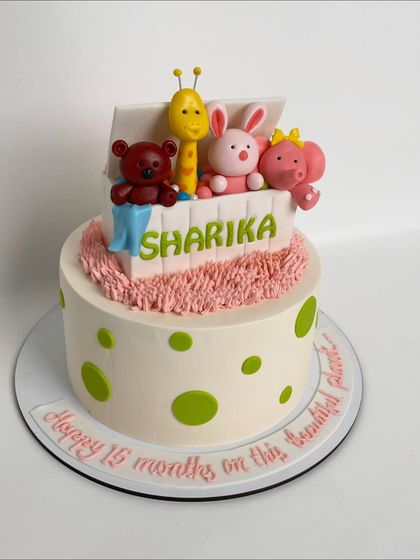 Another angle of the charming toy box cake, showing the playful polka dot design on the bottom tier.