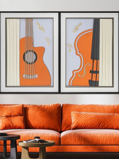 This set of two shadow boxes is a symphony in orange. One features a guitar and the other a violin, both with 3D musical notes. They are perfect for a music room or any space that needs a touch of creative energy.