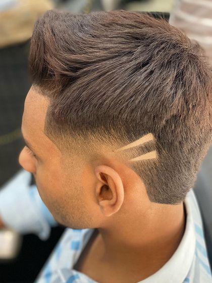 A detailed shot of a two-line hair tattoo, showing the clean execution and sharp angles I can achieve.