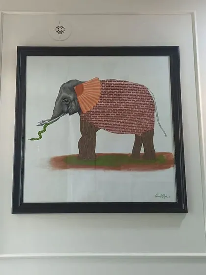 Another view of the framed painting on the wall.