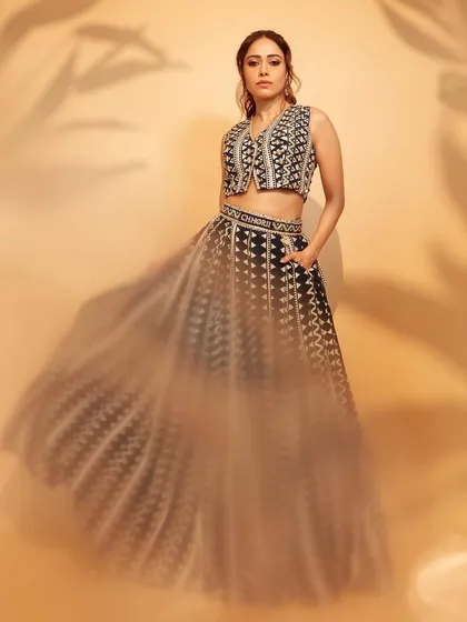 For the Chhorii 2 announcement, I styled Nushrratt Bharuccha in this custom SVA Couture lehenga. The geometric mirror work gives a modern edge to the traditional ghagra choli silhouette.