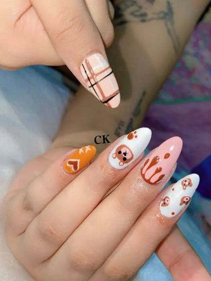 A cute and playful set featuring hand-painted teddy bears, chocolate drips, hearts, and a plaid accent nail.