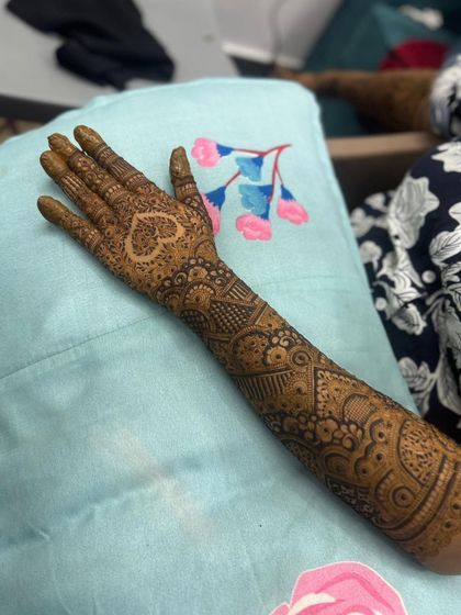 A full view of the arm, showing how the heart motif on the back of the hand complements the entire design.