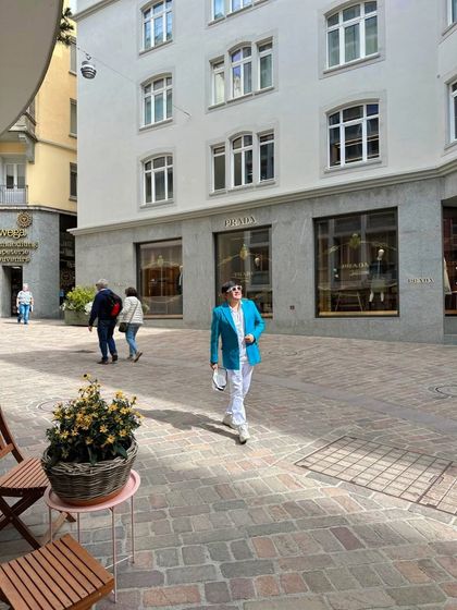 Walking past the Prada store in Switzerland. Window shopping in Europe's fashion districts is a key part of my research and inspiration process.