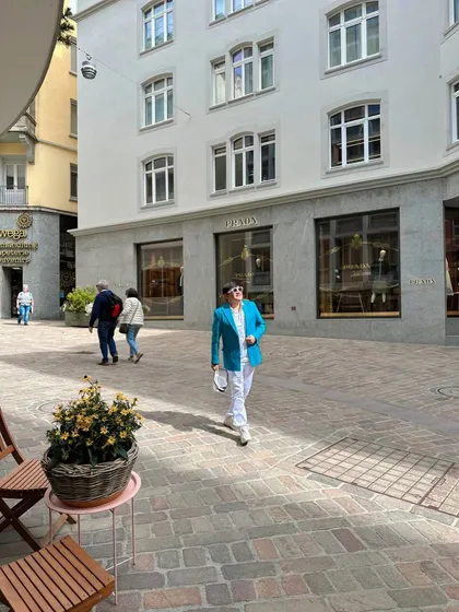 Walking past the Prada store in Switzerland. Window shopping in Europe's fashion districts is a key part of my research and inspiration process.
