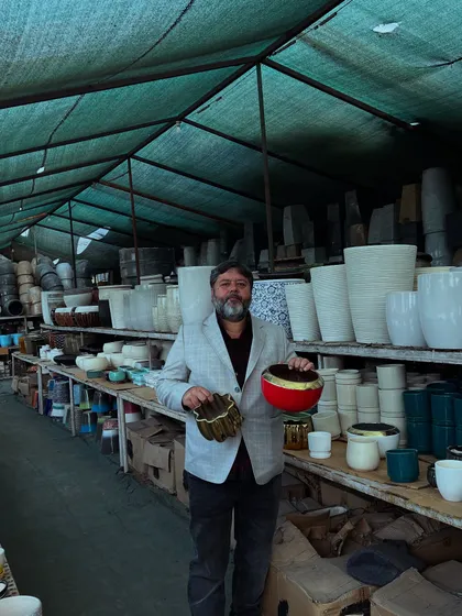Here I am in our pots and planters section, showing a couple of our unique ceramic pots. We have a huge variety, so you are sure to find something that fits your style and budget.