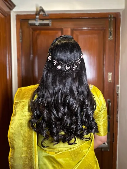 Another view of the beautiful braided half-updo, showcasing the detail and craftsmanship involved.